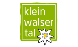 GRUPPENCHALETS 11 a green square with white text and a flower